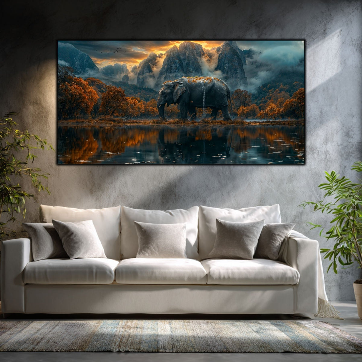Tablou panoramic Elder Vale cu elefant reflectat în lac și creste alpine, amplasat deasupra unei canapele albe